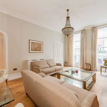 Rent this 4 bed townhouse on 14 South Street in London, W1K 1HP