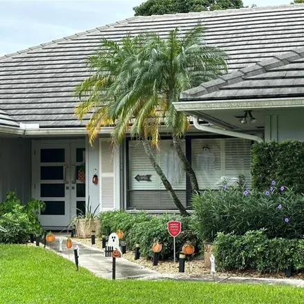 Rent this 4 bed house on PGA National Resort's The Fazio course in 10th Terrace, Palm Beach Gardens