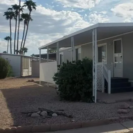 Buy this 2 bed house on 3300 East Broadway Road in Mesa, AZ 85204