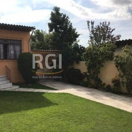 Buy this 3 bed house on Rua Atílio Supertti in Vila Nova, Porto Alegre - RS