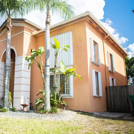 Rent this 4 bed house on 7-Eleven in 1 West Flagler Street, Miami