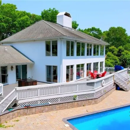 Rent this 4 bed house on 19 Bay Woods Drive in Southampton, Hampton Bays