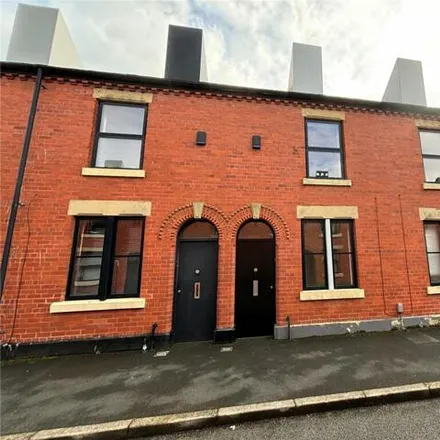 Rent this 2 bed townhouse on Reservoir Street in Salford, M6 5WB