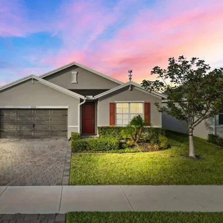 Buy this 4 bed house on Northeast White Pine Terrace in Ocean Breeze, Jensen Beach
