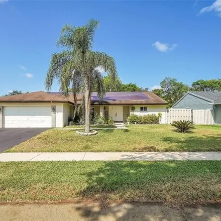 Buy this 3 bed house on 827 Monticello Avenue in Davie, FL 33325