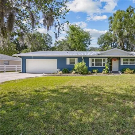 Buy this 4 bed house on 4487 Northwest 32nd Avenue in Alachua County, FL 32606