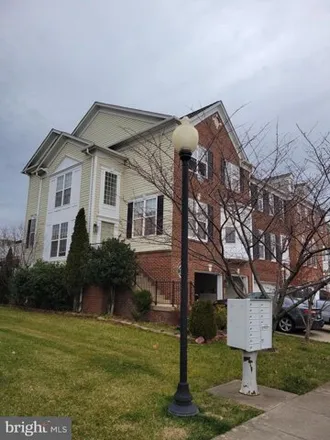 Rent this 3 bed townhouse on 22681 Lamoreaux Landing Square in Loudoun County, VA 20148