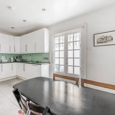 Rent this 4 bed house on 9 Farrier Walk in London, SW10 9FW