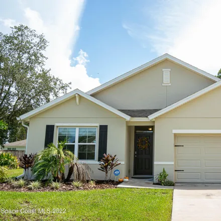 Buy this 4 bed house on 548 Ortega Street Southeast in Palm Bay, FL 32909