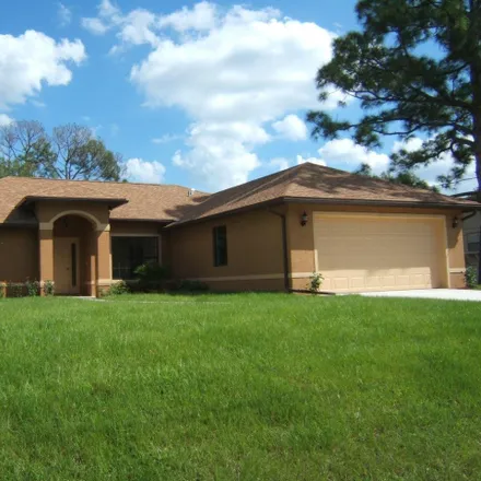 Buy this 3 bed house on 5304 Palm Drive in Indian River Estates, Saint Lucie County