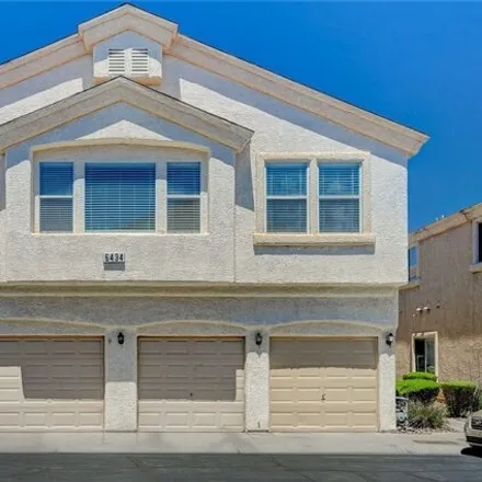 Buy this 2 bed townhouse on 6480 Rusticated Stone Avenue in Clark County, NV 89011