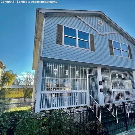 Rent this 3 bed townhouse on 383 15th Avenue in Newark, NJ 07103