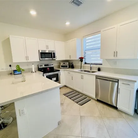 Rent this 3 bed apartment on unnamed road in Fort Lauderdale, FL 33315