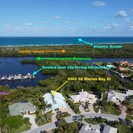 Buy this 5 bed house on 8912 Southeast Marina Bay Drive in Martin County, FL 33455