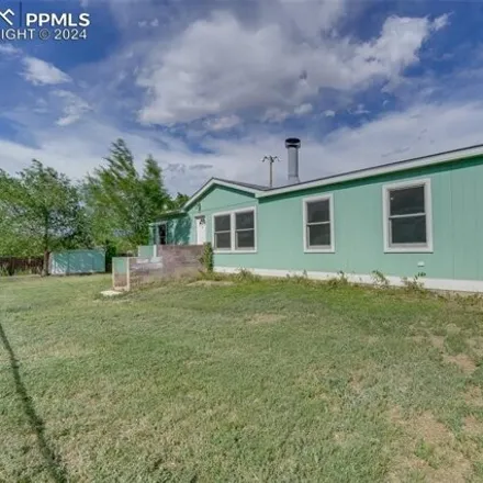 Buy this studio apartment on 983 East 5th Street in Florence, Fremont County