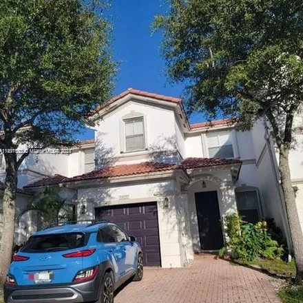 Rent this 3 bed townhouse on 8127 Northwest 108th Place in Doral, FL 33178