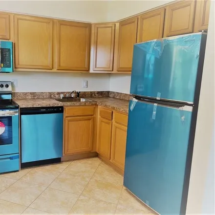 Rent this 2 bed condo on 309 Northeast 16th Street