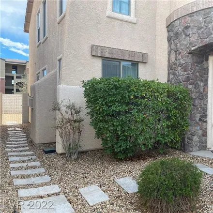 Rent this 4 bed loft on 445 Edgeworth Place in Paradise, NV 89123