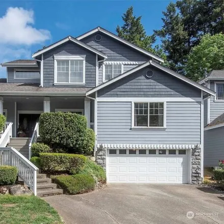 Buy this 4 bed house on 910 Pike Street Northwest in Auburn, WA 98001