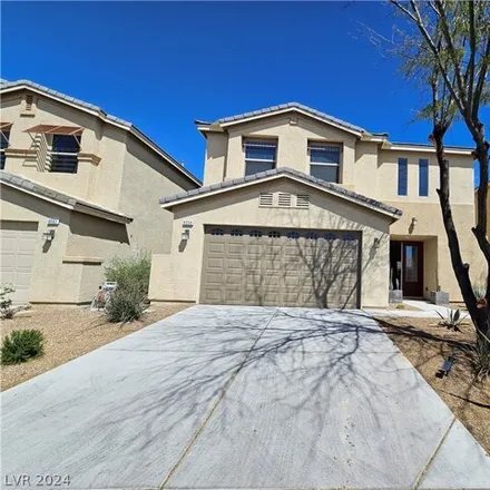 Rent this 4 bed house on 8034 Minots Ledge Avenue in Spring Valley, NV 89147