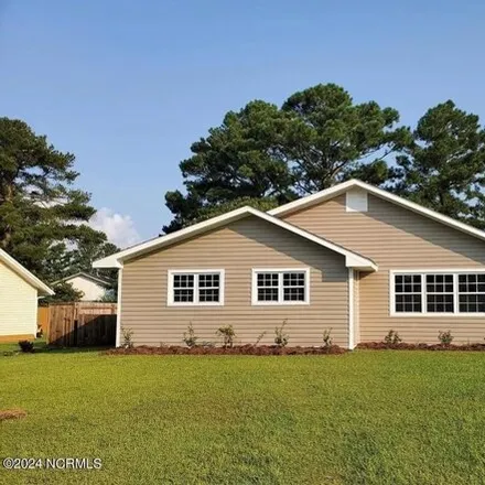 Rent this 4 bed house on 354 Dennis Road in Cardinal Village, Jacksonville