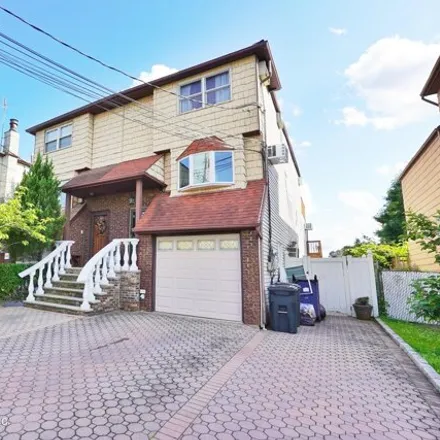 Buy this 4 bed house on 244 Slater Boulevard in New York, NY 10305