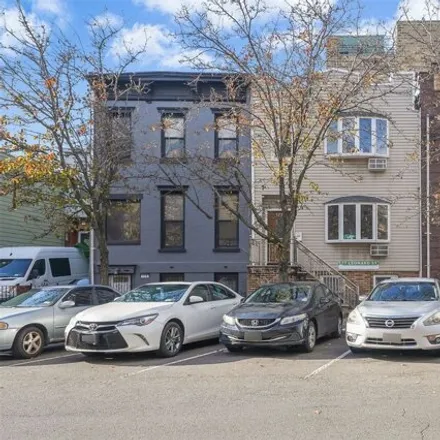 Buy this 7 bed house on 177 Leonard Street in New York, NY 11206
