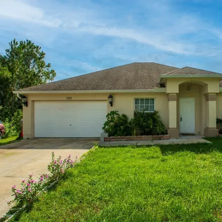 Buy this 4 bed house on 7785 103rd Court in Vero Lake Estates, Indian River County