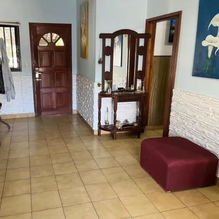 Buy this 3 bed house on Santa Eugenia in Partido de Lomas de Zamora, B1834 FYG Turdera