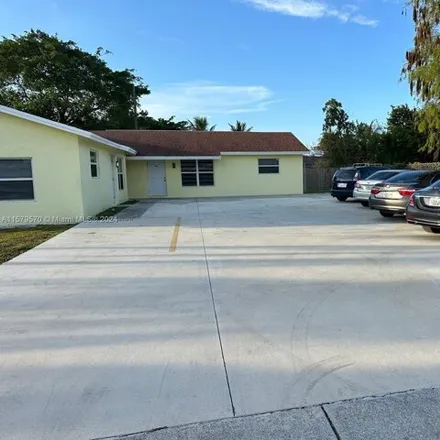 Buy this studio house on 3113 Cherokee Avenue in Westgate-Belvedere Homes, Palm Beach County