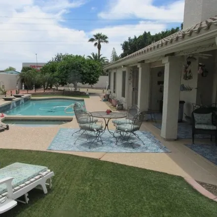 Buy this 4 bed house on East Guadalupe Road in Gilbert, AZ 85234
