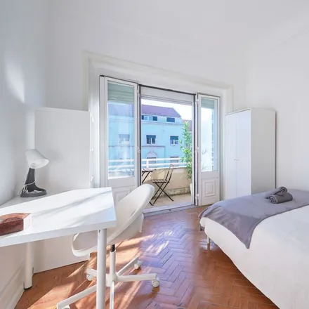 Rent this 12 bed room on Avenida Almirante Reis