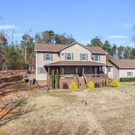 Buy this 4 bed house on 486 Widd Lawing Ln in Union Mills, North Carolina