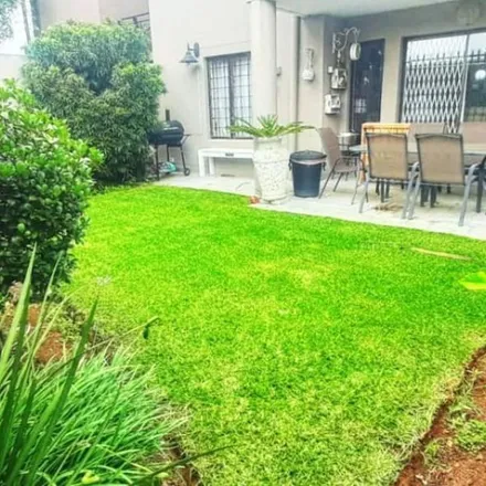 Rent this 2 bed townhouse on Lineata Avenue in Glenanda, Johannesburg