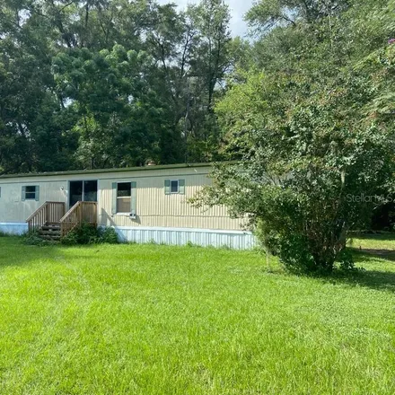 Buy this 2 bed house on 19518 Northwest 119th Place in Alachua, FL 32615