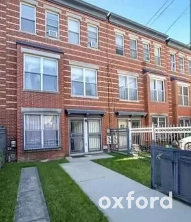 Buy this 5 bed townhouse on 2086 Dean Street in New York, NY 11233