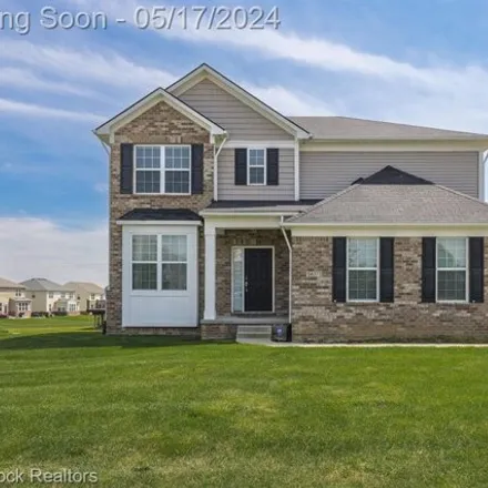 Buy this 4 bed house on 58279 Jonagold Lane in Lyon Charter Township, MI 48165