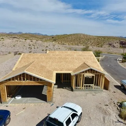 Buy this 3 bed house on 3198 Secret Pass Canyon Drive in Bullhead City, AZ 86429