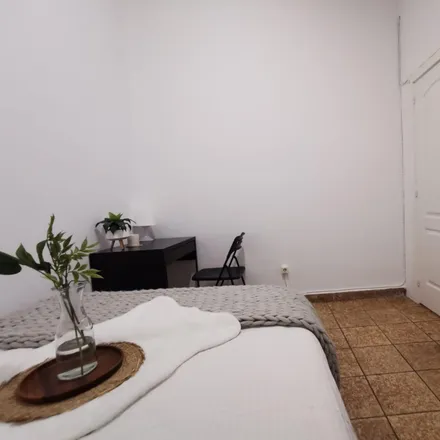 Rent this 11 bed room on Calle Preciados in 42, 28013 Madrid