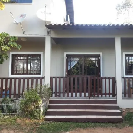 Buy this 4 bed house on Escola Municipal de 1º Grau Ladislau De Oliveira Nunes in Rua Getúlio Vargas, Vila Natal
