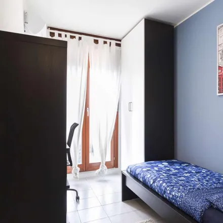 Rent this 8 bed room on Largo Cavalieri di Malta 8 in 20146 Milan MI, Italy