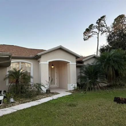 Rent this 3 bed house on 21130 Bachmann Boulevard in Charlotte County, FL 33954