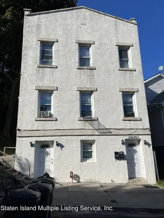 Buy this 4 bed duplex on 23 Tilden Street in New York, NY 10301