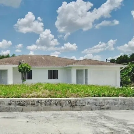 Buy this 6 bed house on 1599 Gilbert Avenue South in Lehigh Acres, FL 33973