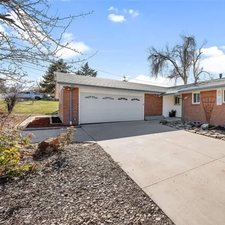 Buy this 4 bed house on 3001 Simms Street in Lakewood, CO 80215