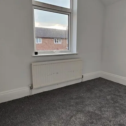 Rent this 3 bed townhouse on Manjits Nail & Beauty in 88 Alexandra Road, Wellingborough