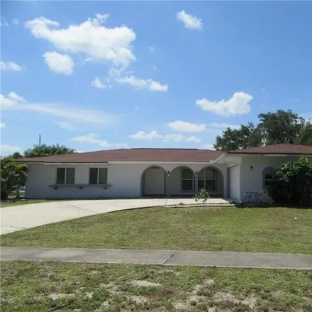 Rent this 3 bed house on 207 Fields Terrace Southeast in Port Charlotte, FL 33952