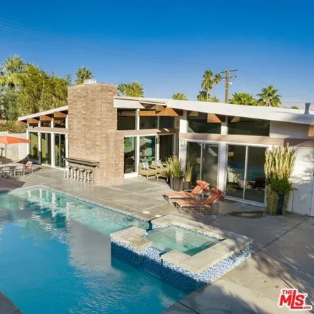 Rent this 4 bed house on Royal Palm Court in Palm Springs, CA 92292
