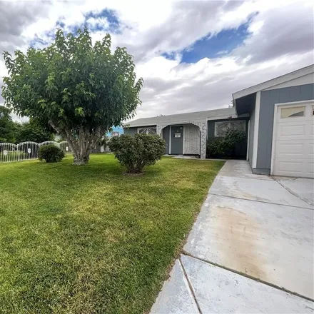 Buy this 4 bed house on 2604 White Oak Road in North Las Vegas, NV 89030