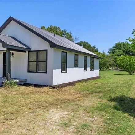 Rent this 4 bed house on 1031 East Pine in Alvord, TX 76225